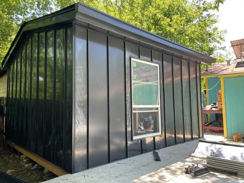 Black standing seam metal wall panels for Roof Inspection in El Dorado